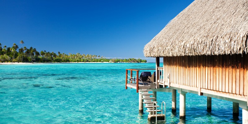 Over water bungalow with steps into lagoon